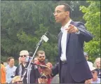  ??  ?? Shawn Wooden, Democratic candidate for treasurer, speaks at the rally.