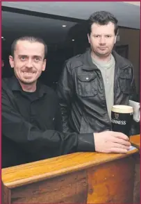  ??  ?? ABOVE: Johnny Mulcahy (left) serving a real good pint to customer James Galvin, Killarney, at Corkery’s Bar, High Street, Killarney.