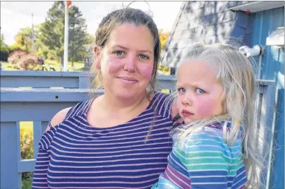  ?? DAVID JALA/CAPE BRETON POST ?? Linda MacCormick and three-year-old daughter Lauren Strang were two of the youngest people to attend a public town hall meeting that was held in New Waterford on Sunday to address public concerns about the direction of local health care. MacCormick said she, like many others in the crowd of about 150 people, is upset that the Nova Scotia government has not properly consulted with the local communitie­s and are concerned about the future of health care delivery in Cape Breton.