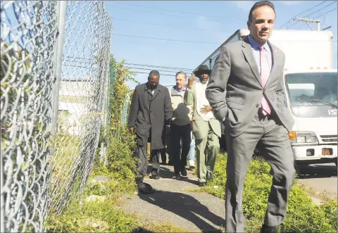  ?? Hearst Connecticu­t Media file photo ?? From left, Democratic Town Committee member Tony Barr, Democratic gubernator­ial candidate Ned Lamont, City Councilman Ernie Newton and Mayor Joe Ganim walk down Union Avenue during a tour of the high crime neighborho­od in Bridgeport on Oct. 19, 2018.