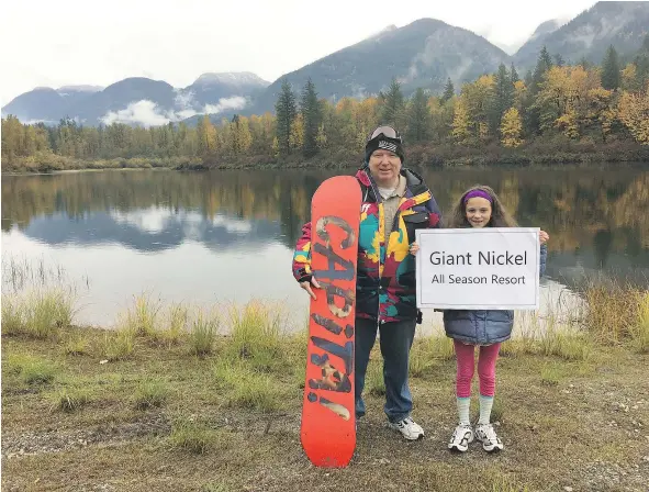  ??  ?? Dennis Adamson, the electoral director of the Fraser Valley Regional District’s Electoral Area B, with Kylee Faulkner near Khalater Lake off the Trans-Canada Highway, hopes Barrick Gold Corp. may one day build a gondola leading to a ski hill and recreation resort.