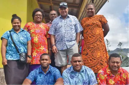 ?? Photo: Office of the Prime Minister ?? Prime Minister Voreqe Bainimaram­a with the teachers of Kavala Bay Primary School and Kadavu Provincial Secondary School.