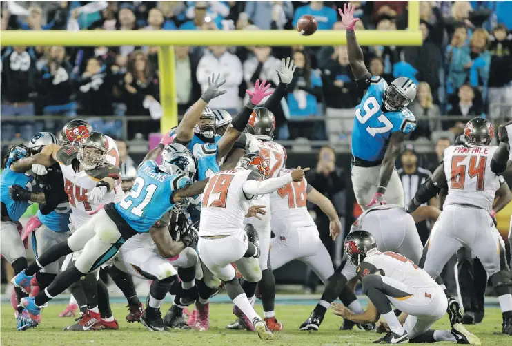  ?? — THE ASSOCIATED PRESS ?? Tampa Bay Buccaneers rookie kicker Roberto Aguayo kicks the game-winning field goal against the Carolina Panthers Monday night in Charlotte, N.C.