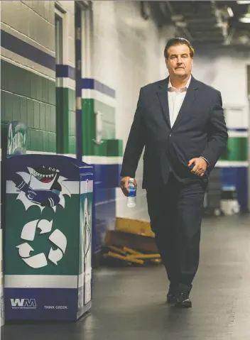  ?? ARLEN REDEKOP/FILES ?? General manager Jim Benning was given a contract extension largely because he sold the team owners on a plan where the Canucks would become a playoff team in a shorter window, writes Ed Willes.