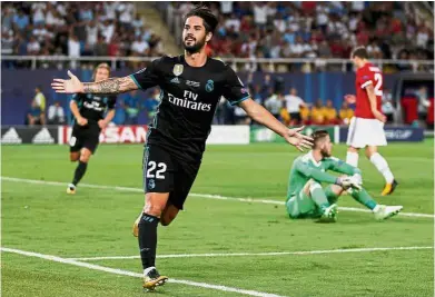  ??  ?? Killer touch: Isco celebrates after scoring Real Madrid’s second goal against Manchester United in the UEFA Super Cup in Skopje on Tuesday. Real won 2-1. — Reuters