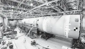  ?? Associated Press ?? This August 2019 photo released by NASA shows the core stage for NASA’s Space Launch System rocket at the agency’s Michoud Assembly Facility.