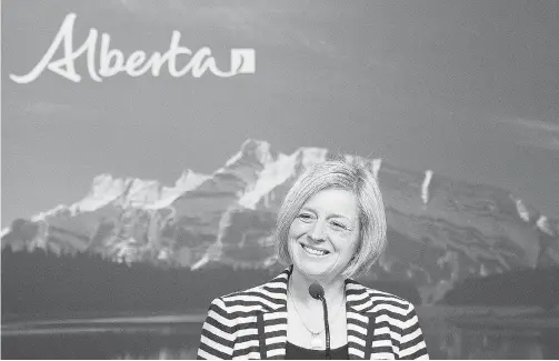  ?? NATHAN DENETTE / THE CANADIAN PRESS ?? Alberta premier-designate Rachel Notley smiles as she speaks to the media during a press conference in Edmonton on Wednesday.