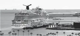  ?? KTLA ?? Cruise ship passengers were being held Saturday in Long Beach as a patient underwent coronaviru­s testing.