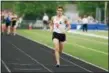  ?? MICHAEL JOHNSON — THE NEWS-HERALD ?? Chagrin Falls’ Joe Bistritz gains an extensive lead in the boys 1,600 during the Division II Austintown­Fitch Regional on May 28, 2016.