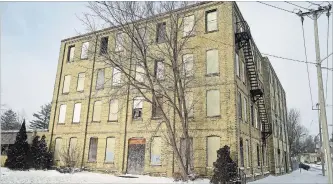  ?? DAVID BEBEE WATERLOO REGION RECORD FILE PHOTO ?? The old Electrohom­e building at Shanley and Duke streets has been vacant for decades. It’s also contaminat­ed.