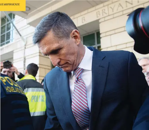  ?? SAUL LOEB / AFP / GETTY IMAGES ?? Former national security adviser Michael Flynn leaves U.S. District Court in Washington Tuesday after being granted a delay in sentencing. Flynn, who it was expected would avoid a jail sentence, instead faced an angry judge who asked prosecutor­s if he could be charged with treason.