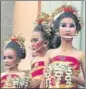  ??  ?? Dancers seen in face shields at a festival in Bali, Indonesia.