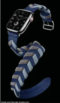  ?? ?? Apple and Hermès double-turn
Bridon bracelet in navy-colored mesh.