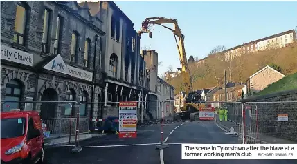  ?? RICHARD SWINGLER ?? The scene in Tylorstown after the blaze at a former working men’s club