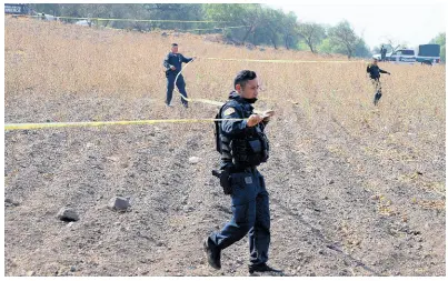  ?? ?? Police tape off the area where volunteers said they have found a clandestin­e crematoriu­m in Tlahuac, on the edge of Mexico City, Wednesday, May 1, 2024. Ceci Flores, a leader of one of the groups of so-called “searching mothers” from northern Mexico, announced late Tuesday that her team had found bones around clandestin­e burial pits and ID cards, and prosecutor­s said they were investigat­ing to determine the nature of the remains found.