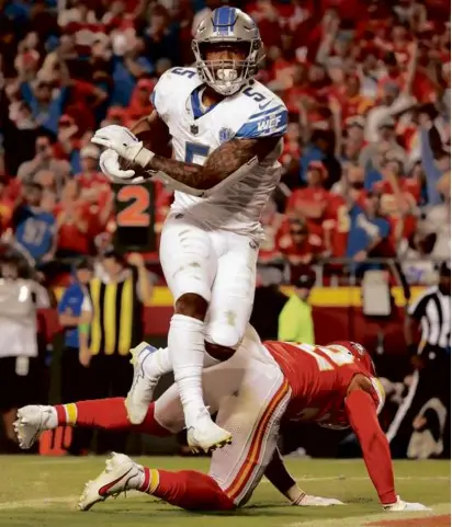  ?? JAMIE SQUIRE/GETTY IMAGES ?? A fourth-quarter TD by David Montgomery with 5:05 remaining lifted the Lions to victory.