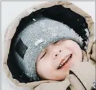  ?? Photograph courtesy of Miranda Henry ?? Pure joy was reflected on the face of many children experienci­ng their first snowfall.