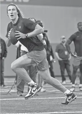  ?? DAVID PLATT/CLEMSON ATHLETICS ?? Trevor Lawrence worked out during a pro day last month at Clemson.