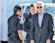  ?? ?? Mr Biden is briefed by officers at the Us-mexico border during his visit