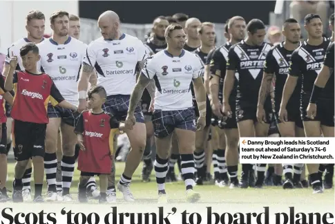  ??  ?? Danny Brough leads his Scotland team out ahead of Saturday’s 74-6 rout by New Zealand in Christchur­ch.