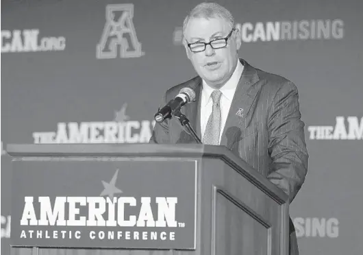  ?? STEW MILNE/AP ?? American Athletic Conference Commission­er Mike Aresco told reporters Tuesday at football media days that the league is not planning to expand after UConn’s exit.