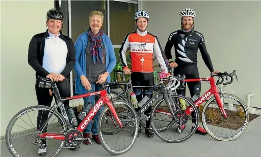  ?? PHOTO: SUPPLIED ?? Kind-hearted cyclists, from left, Nick Blakiston, with Kaikoura deputy mayor Julie Hoden, Leatham Landon Lane and Callum Saunders who raised money with their epic cycle trek.