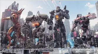  ?? LEGENDARY PICTURES UNIVERSAL PICTURES ?? Giant robots, known as Jaegers, must defend the world from monsters from another dimension in “Pacific Rim: Uprising,” now out on DVD.