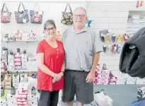  ?? Photo / Warren Buckland ?? Margaret and Garry Mills in their Taradale shoe shop, which is closing down.