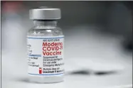  ?? JENNY KANE — THE ASSOCIATED PRESS FILE ?? A vial of the Moderna COVID-19 vaccine is displayed on a counter at a pharmacy Dec. 27in Portland, Ore.