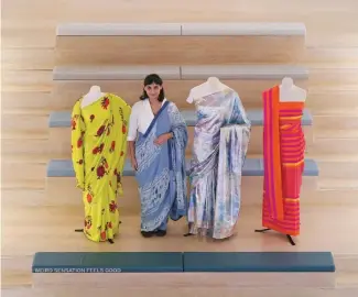  ?? ?? Priya Khanchanda­ni, head of curatorial at the Design Museum, wears a distressed denim sari by designer Diksha Khanna, alongside saris that will be displayed in “The Offbeat Sari” exhibition.