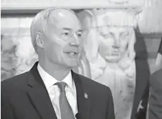  ?? Kelly P. Kissel/Associated Press ?? ■ Arkansas Gov. Asa Hutchinson speaks March 1 at a state Capitol news conference in Little Rock. In an appearance Friday before the state Bar Associatio­n in Hot Springs, Ark., Hutchinson said he supported tougher ethics rules for state legislator­s,...