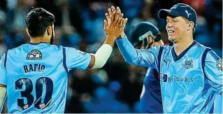  ?? ALAMY ?? High fives: Azeem Rafiq and Gary Ballance celebrate a wicket in 2017