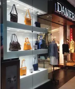  ?? MELISSA RENWICK/TORONTO STAR FILE PHOTO ?? Danier Leather is just one Canadian apparel company that has seen sales decline amid increased competitio­n from internatio­nal brands.