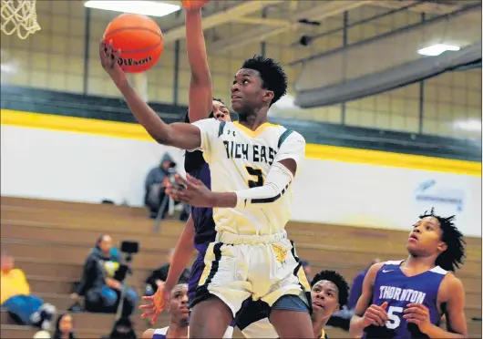  ?? GARY MIDDENDORF/DAILY SOUTHTOWN ?? Rich East’s Gary Clay Jr. soars to the basket for a layup during a game against Thornton on Feb. 14, 2020. No basketball games have been played this season.