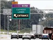  ?? BOB ANDRES / BANDRES@AJC.COM ?? Motorists are taking more than 20,000 trips a day on the Northwest Corridor Express Lanes on I-75 and I-575 in Cobb and Cherokee counties.