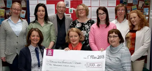  ??  ?? At the presentati­on of a cheque for €1,000 to Bridgetown College by the Write By The Sea Festival (from left) back - Siobhan Cronin, Jenny Roche, Billy Roche, Kara Cahill, Susan Kelleher, Anne Hally and Stephanie McKenna; front – Sylvia Kehoe (Write By...