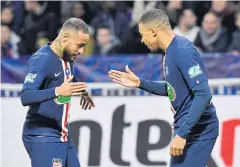  ?? AFP ?? PSG’s Neymar, left, and Kylian Mbappe celebrate a goal.