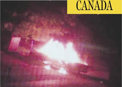  ??  ?? Four people were injured in a truck blaze in Winnipeg Saturday night when a bag they picked up in a 7-Eleven parking lot exploded after they drove off. Police say all four were innocent bystanders in the case.