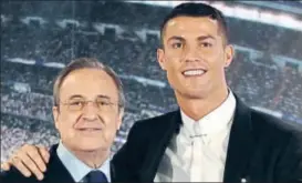  ?? AFP ?? Cristiano Ronaldo with Real Madrid president Florentino Perez during the renewal of contract.