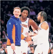  ?? N.Y. Post: Charles Wenzelberg ?? GETTING TO KNOW YOU: Donte DiVincenzo (from left), OG Anunoby and Jalen Brunson talk during the fourth quarter Wednesday.