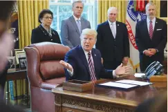  ?? (Jonathan Ernst/Reuters) ?? US PRESIDENT Donald Trump speaks surrounded by SBA administra­tor Jovita Carranza, Kevin McCarthy, Rep. Steve Scalise and Sen. Dan Sullivan during a signing ceremony for the ‘Paycheck Protection Program and Health Care Enhancemen­t Act’ in Washington this week.