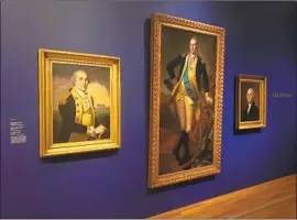  ?? Christophe­r Knight Los Angeles Times ?? ONE standout moment of the exhibition is a lineup of three portraits of George Washington, all acquired in 1919, including a dollar-bill classic by Gilbert Stuart.