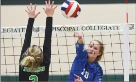  ?? (Arkansas Democrat-Gazette/Staci Vandagriff) ?? Paris’ Jacee Hart (10) hits past Hoxie’s Cara Forrester during a Class 3A volleyball state tournament semifinal Thursday at Episcopal Collegiate in Little Rock. Paris won 3-0 to advance to Saturday’s championsh­ip against Hackett. More photos at arkansason­line.com/1030volley­3a/.