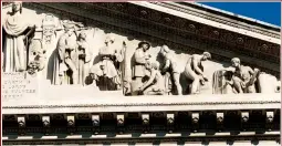  ??  ?? Easy to miss . . . the pediment of the Royal Exchange, which features an enslaved African man kneeling