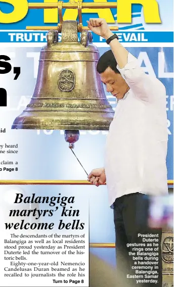  ??  ?? President Duterte gestures as he rings one of the Balangiga bells during a handover ceremony in Balangiga, Eastern Samar yesterday.