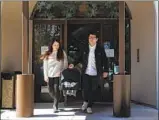  ?? Gina Ferazzi Los Angeles Times ?? CYNTHIA and Nelson Rodriguez with 2-weekold Mateo after a pediatrici­an’s visit in Orange.