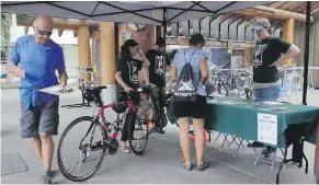  ?? JASON PAYNE ?? BEST Bicycle Valet is offering a free (tips are appreciate­d) bicycle lock-up service on Granville Island during the summer.