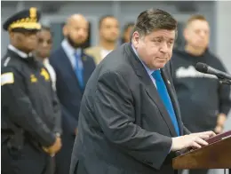  ?? BRIAN CASSELLA/CHICAGO TRIBUNE ?? Gov. J.B. Pritzker answers questions in May after signing a bill restrictin­g the sale and possession of unserializ­ed firearms.