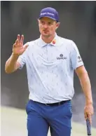  ?? CURTIS COMPTON AP ?? First-round leader Justin Rose acknowledg­es the crowd after a birdie on No. 16.