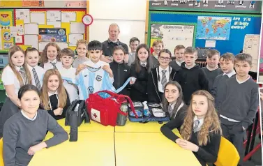  ??  ?? Mark Dorward, first aider for East Craigie FC, with P6s at Ancrum Road Primary.